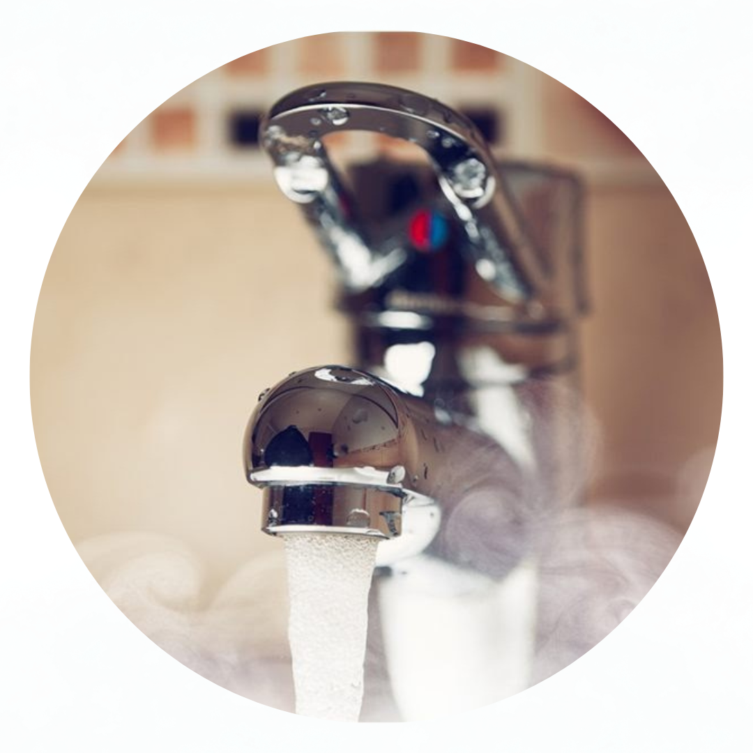 Hot water coming out of a faucet
